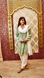 View a comfortable white Afghani pant, designed for ultimate ease. A chic ethnic bottom wear.