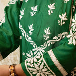 Close-up of hand-embroidered Bottle Green Viscose Rayon Kurti. Features intricate thread work, elegant and popular.