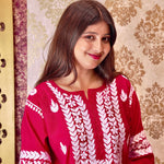Close-up of Aliya Chikankari Kurti in hot pink viscose cotton. View exquisite hand embroidery, trending chikan kurti design.