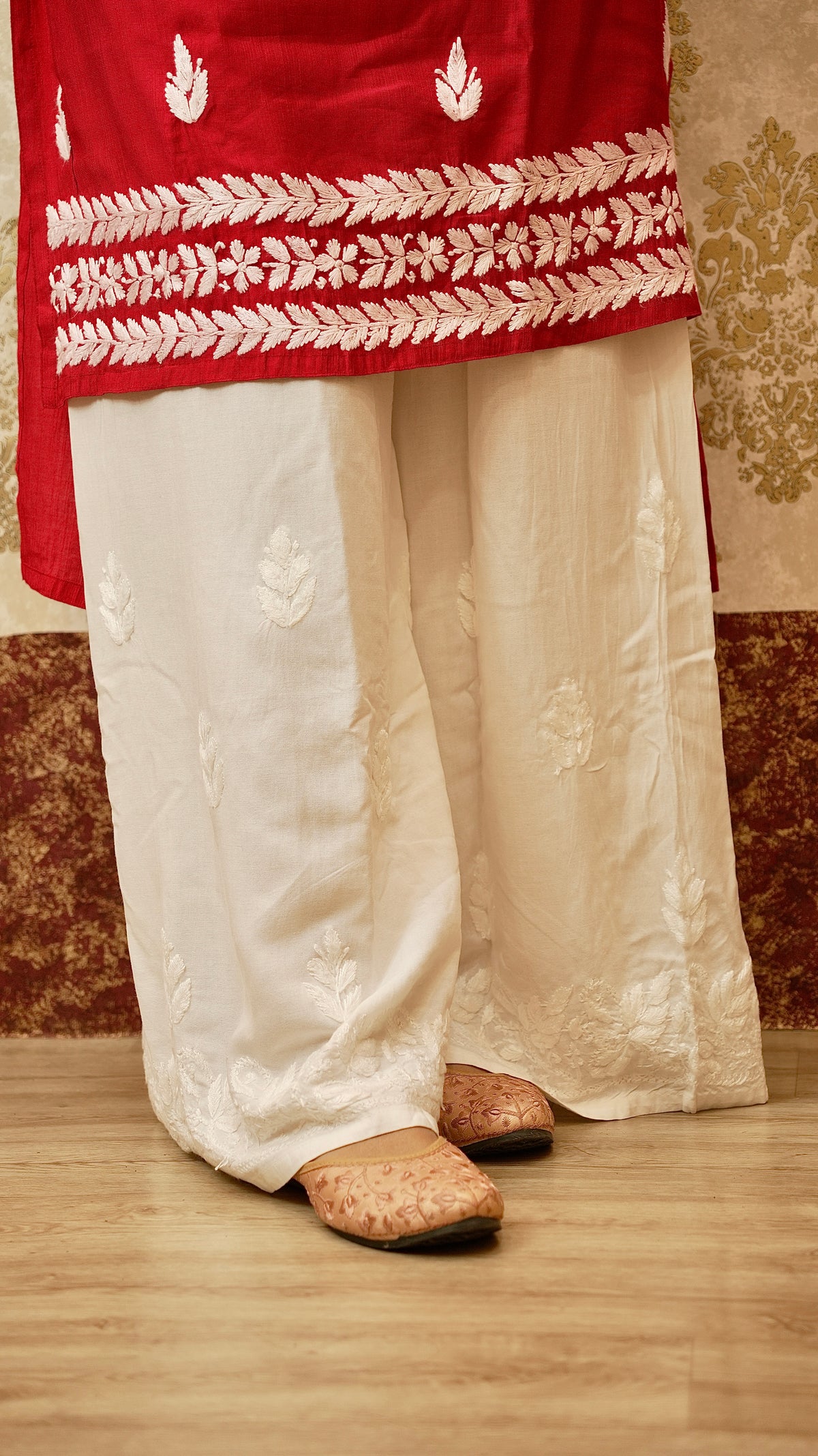 View comfortable Lucknowi palazzo, crafted from breathable rayon cotton fabric. Versatile ethnic bottom wear.