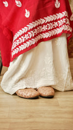 Detailed view of Lucknowi hand embroidery on a flowing rayon cotton palazzo. Timeless bottom pants.