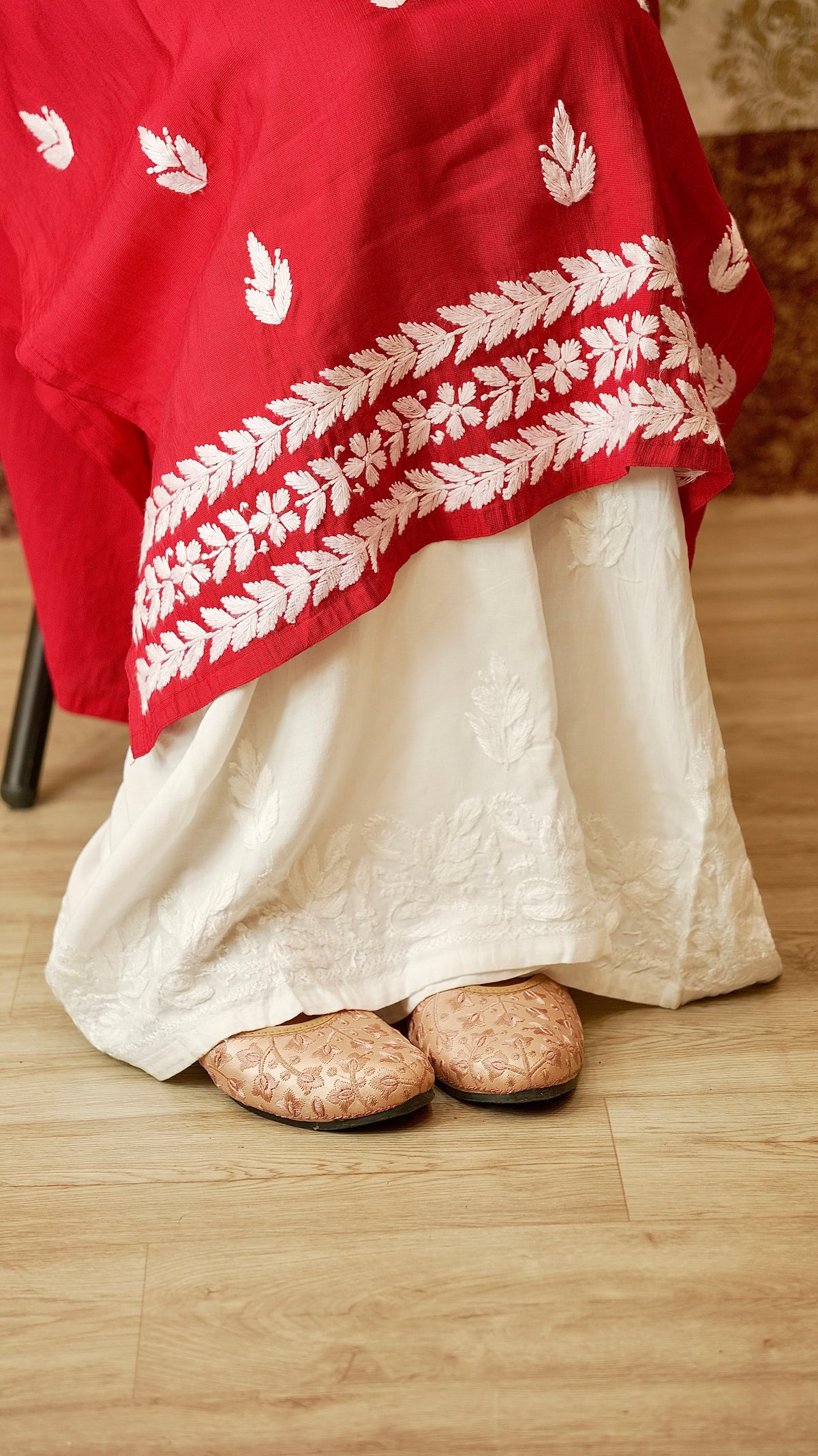 View an elegantly draped rayon cotton palazzo, with authentic Lucknowi embroidery. Comfortable bottom pants.