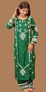 Front view Bottle Green Viscose Rayon Kurti Set. Features white embroidery, trendy design. View stylish women's ethnic wear.