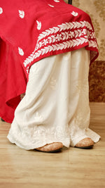 View a comfortable rayon cotton palazzo, featuring intricate Lucknowi handwork. Perfect ethnic bottom wear.