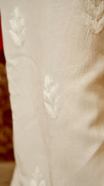 View the flowing design and authentic Lucknowi handwork on a rayon cotton palazzo. Versatile ethnic bottom wear.