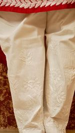 Close-up of embroidered cotton lycra shalwar. View traditional Chikankari pants, ideal for comfort and style.