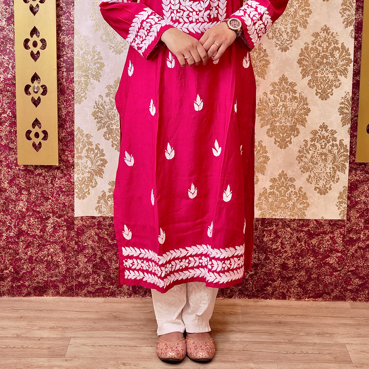 Full view of hot pink viscose cotton kurti with white embroidery. View stylish chikankari kurta for women, trending Gota Patti look.