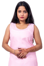 Close-up of soft baby-pink cotton inner for women. Smooth fabric inner wear.