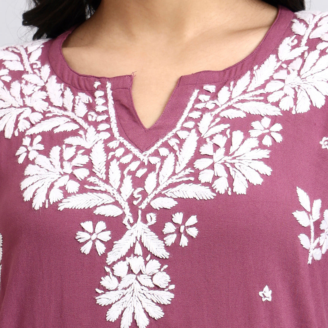 Zoom view of Purple top with white floral embroidery