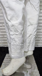 View crisp white Rose Cotton Lycra Pants. Features delicate machine embroidery for comfortable bottom wear.