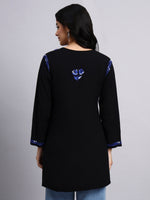 Back view of Black kurta with blue embroidery on a gray background
