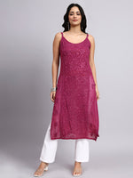 Front look of Woman wearing a rani pink embroidered kurta with white pants on a gray background