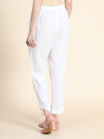 View a free-size white Chikankari Pant with soft flow and authentic handwork. Versatile ethnic bottom wear for women.