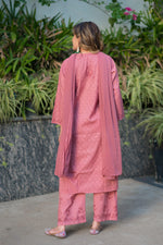 Back view of an Alfiya Mul Mul Set, a lightweight cotton kurti for humid weather Chikankari fashion.