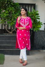 Subtle Chikankari pink kurta for women in soft cotton, front view. Classic threadwork, ideal for daily wear.