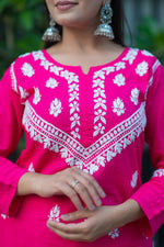Front image of a Chikankari pink kurta for women in light cotton. Features floral embroidery & a comfortable fit.