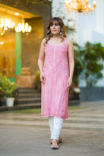 Full shot of a woman in a chic pink Noora Noodle strap kurti, showcasing summer ethnic wear.