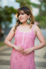 Front shot of a woman in a pink Noora Noodle strap kurti, showing its casual elegance.