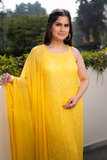 Close-up of fine Chikankari handwork on a Yellow viscose georgette chikankari kurti.