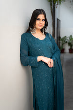 View a Blue Viscose Set, a comfortable pure viscose fabric kurta set with beautiful draping and Chikankari.