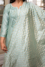 Glistening Zari Cut Dana work on the Green chanderi kurti, highlighting exquisite Chikankari.