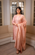 View a luxurious Pink Muslin Chanderi Kurti Set, featuring Chikankari and Zari Cut Dana.