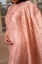 Discover a stunning Pink chanderi kurta, adorned with hand-made Chikankari and Zari embellishments.