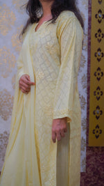 Close-up of intricate Chikankari hand embroidery on a Hiba kurti set's soft cotton fabric.