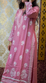 Front view of pink viscose rayon kurti with white chikankari embroidery, perfect for ethnic wear or casual occasions.