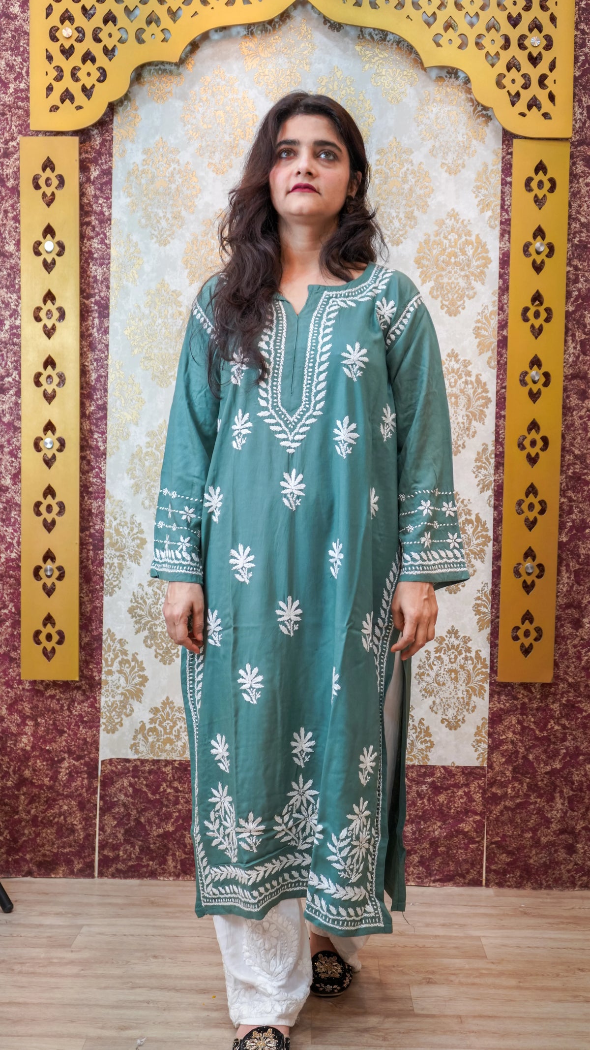 Front view of a pista green Modal Chikankari Kurti, emphasizing its breathable, skin-friendly cotton design.