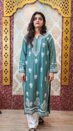 Front view of a pista green Modal Chikankari Kurti, emphasizing its breathable, skin-friendly cotton design.