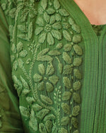 Close-up of unique 3D Chikankari hand embroidery on a green Viscose Georgette Kurti.