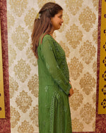 Close-up of intricate 3D Chikankari hand embroidery on a green Viscose Georgette Kurti sleeve.