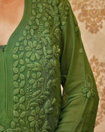 Detailed view of the unique 3D Chikankari embroidery on a green Viscose Georgette Kurta.
