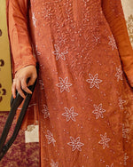 Detailed Zardozi and Chikankari handwork on an orange pure viscose georgette kurti.