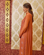 View an orange Viscose Designer Kurta Set with Zardozi and Chikankari work on georgette fabric.