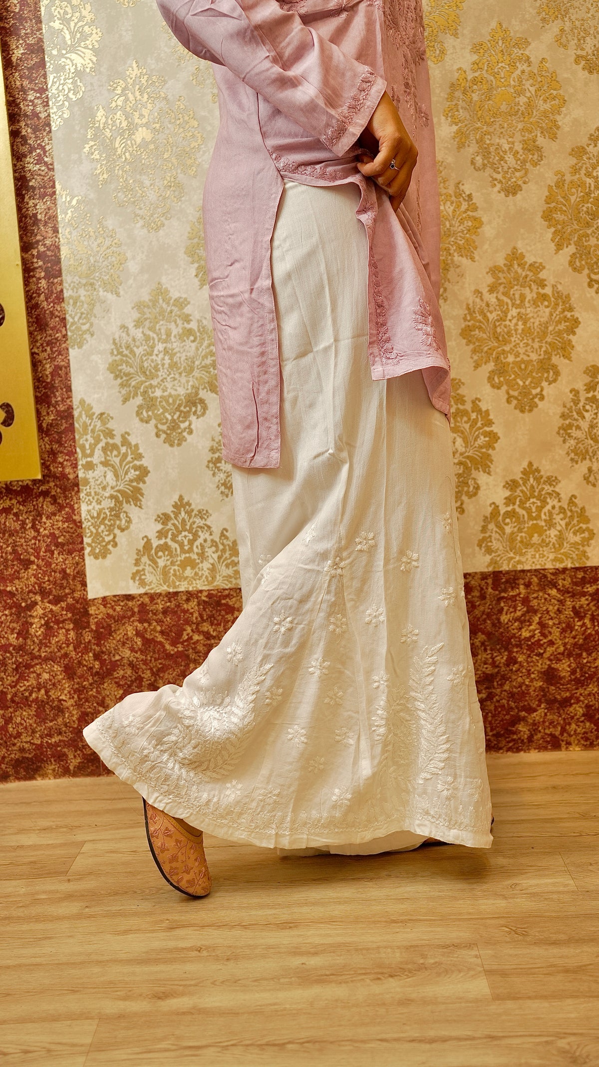 View elegant white Kali Palazzo with original Lucknowi handwork. Features Cotton Rayon for comfortable bottom wear.