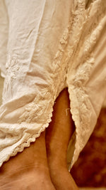 Close-up detail of the hand embroidery and comfortable fit on a Tulip Pant. A chic bottom garment.