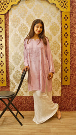 View a flowing white Kali Palazzo in soft Cotton Rayon fabric. Features intricate Lucknowi handwork.