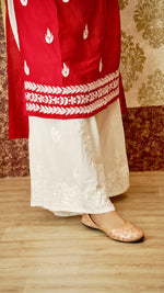 View a comfortable rayon cotton palazzo, featuring intricate Lucknowi handwork. Perfect ethnic bottom wear.