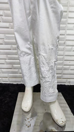 Elegant white Rose Cotton Lycra Pants. Offers comfort fit and flexible fabric, a versatile bottom wear for women.