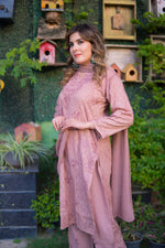 A side view shows a woman in a mauve pink mul cotton kurta outfit with a flowing dupatta.