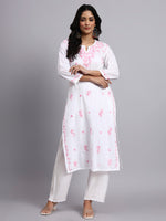 Full view of Woman wearing a white kurta with pink floral patterns on a gray background